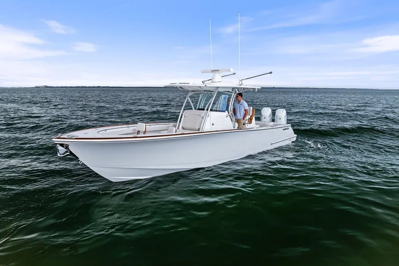 New Valhalla Boatworks V-33 Yacht Photos Pics 2026 Valhalla Boatworks V-33 on open water under clear blue sky.