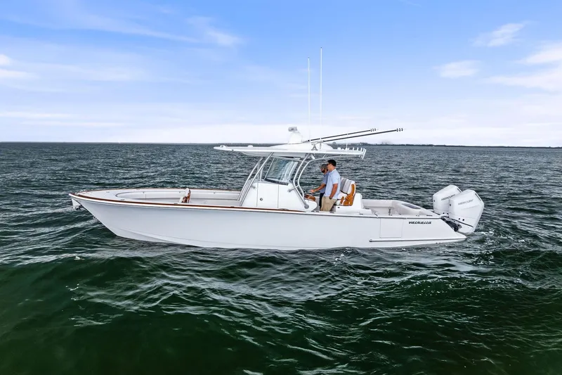 New Valhalla Boatworks V-33 Yacht Photos Pics 2026 Valhalla Boatworks V-33 cruising on open water under clear skies.