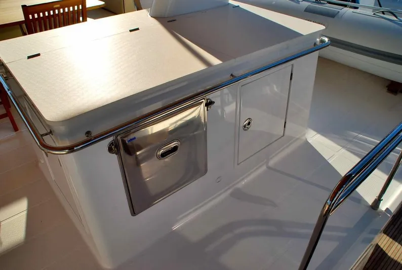  Yacht Photos Pics Outdoor kitchen area on 2011 Fountaine Pajot Queensland 55 yacht with stainless steel features.