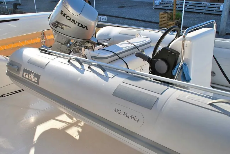  Yacht Photos Pics Inflatable boat with Honda motor on 2011 Fountaine Pajot Queensland 55 yacht.