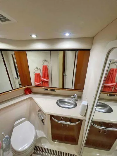  Yacht Photos Pics 2005 Sea Ray Sedan Bridge bathroom with modern fixtures and ample storage.