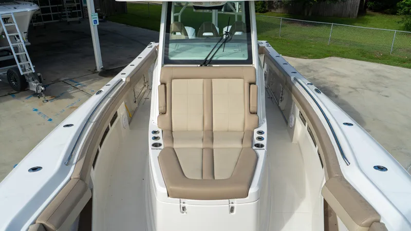  Yacht Photos Pics 2020 Sailfish 360 CC boat interior with beige seating and windshield.