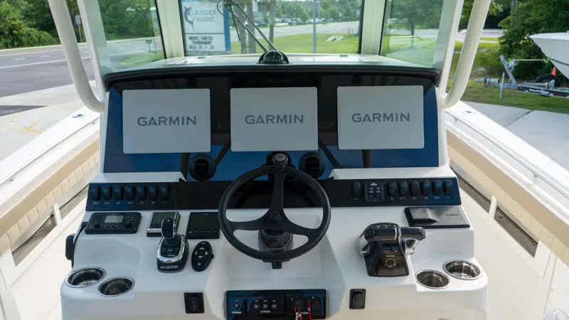  Yacht Photos Pics 2020 Sailfish 360 CC boat dashboard with Garmin navigation displays.