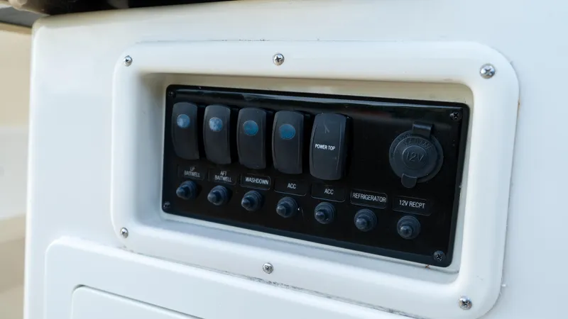  Yacht Photos Pics Control panel of 2020 Sailfish 360 CC boat with multiple switches.
