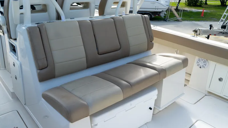  Yacht Photos Pics 2020 Sailfish 360 CC boat seating with beige and brown cushions.