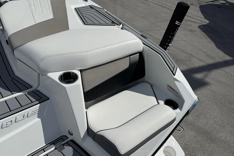  Yacht Photos Pics 2022 Nautique Super Air Nautique G23 boat seating area with cup holders.