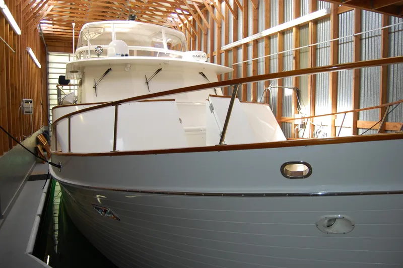 Legacy Yacht Photos Pics 1981 Ocean Alexander 50 Pilothouse yacht in a boathouse.