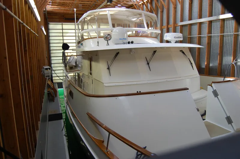 Legacy Yacht Photos Pics 1981 Ocean Alexander 50 Pilothouse in a boathouse.