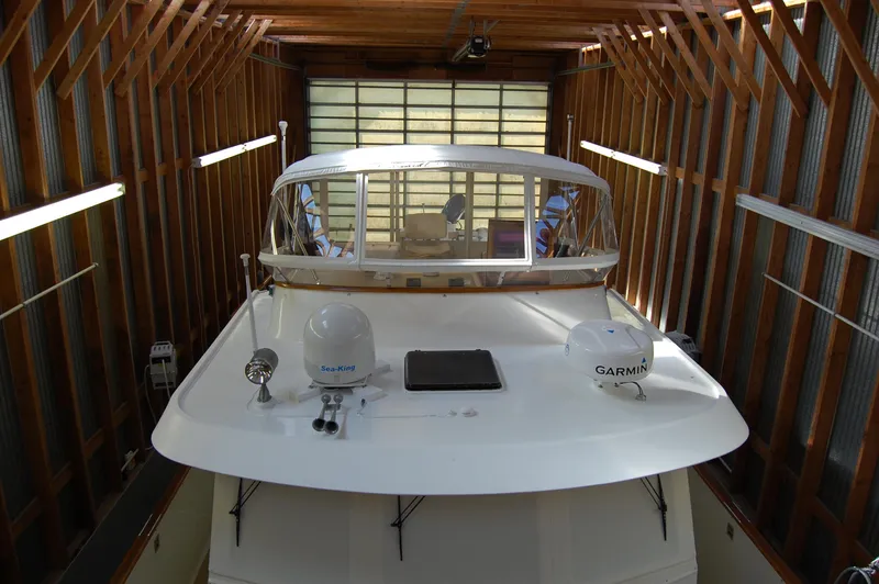 Legacy Yacht Photos Pics 1981 Ocean Alexander 50 Pilothouse in a boathouse.