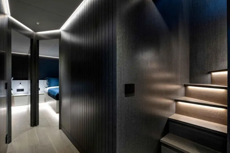  Yacht Photos Pics Luxurious interior of 1985 Heesen Pleasure Vessel with modern lighting and sleek design.