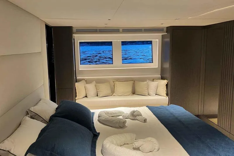  Yacht Photos Pics Luxurious bedroom interior of 1985 Heesen Pleasure Vessel with ocean view window.