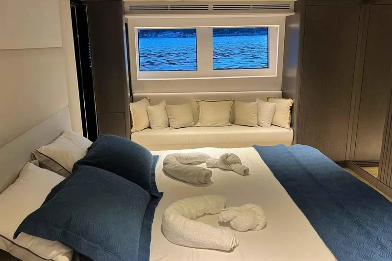  Yacht Photos Pics Luxurious bedroom interior on 1985 Heesen Pleasure Vessel with ocean view.