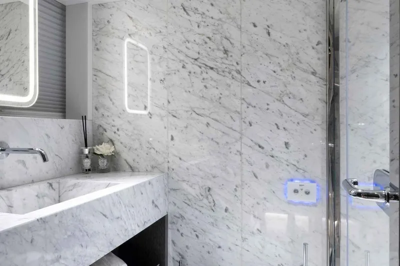  Yacht Photos Pics Luxurious marble bathroom interior on 1985 Heesen Pleasure Vessel.