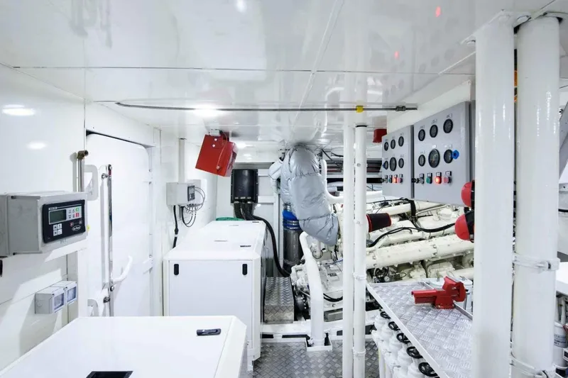  Yacht Photos Pics Engine room of 1985 Heesen Pleasure Vessel with control panels and machinery.