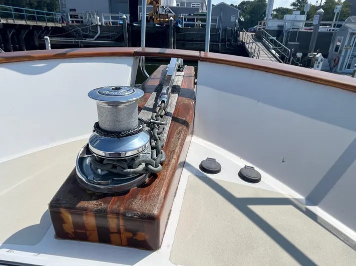 Angus III Yacht Photos Pics Bow of 1998 Alden 56 PHMY yacht with anchor winch and chain.