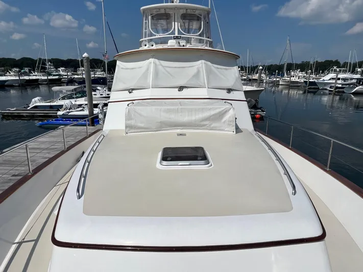 Angus III Yacht Photos Pics Alden 56 PHMY 1998 yacht docked at marina under clear skies.