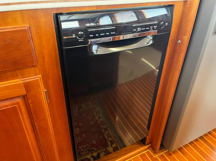 Angus III Yacht Photos Pics Built-in dishwasher in wooden cabinetry, Alden 56 PHMY 1998 model.