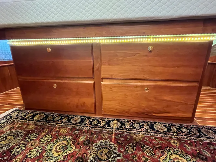 Angus III Yacht Photos Pics Wooden drawers with LED lighting in a 1998 Alden 56 PHMY yacht interior.