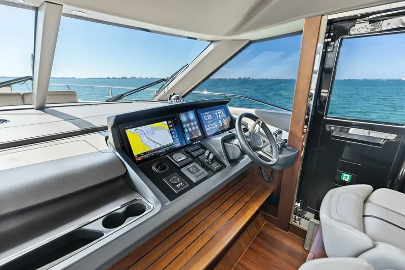 3bboys Yacht Photos Pics Luxurious 2018 Princess Y75 yacht cockpit with advanced navigation system and ocean view.