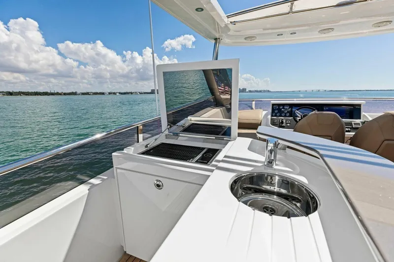 3bboys Yacht Photos Pics Luxury yacht Princess Y75, 2018 model, featuring outdoor kitchen and stunning ocean view.