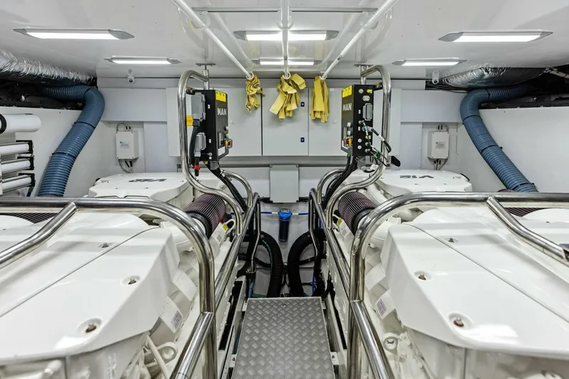 3bboys Yacht Photos Pics Engine room of 2018 Princess Y75 yacht with dual MAN engines and modern equipment.