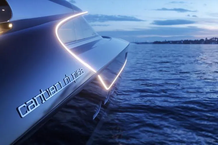  Yacht Photos Pics 2026 Cantieri di Pisa 80 Fast yacht on serene water at sunset.