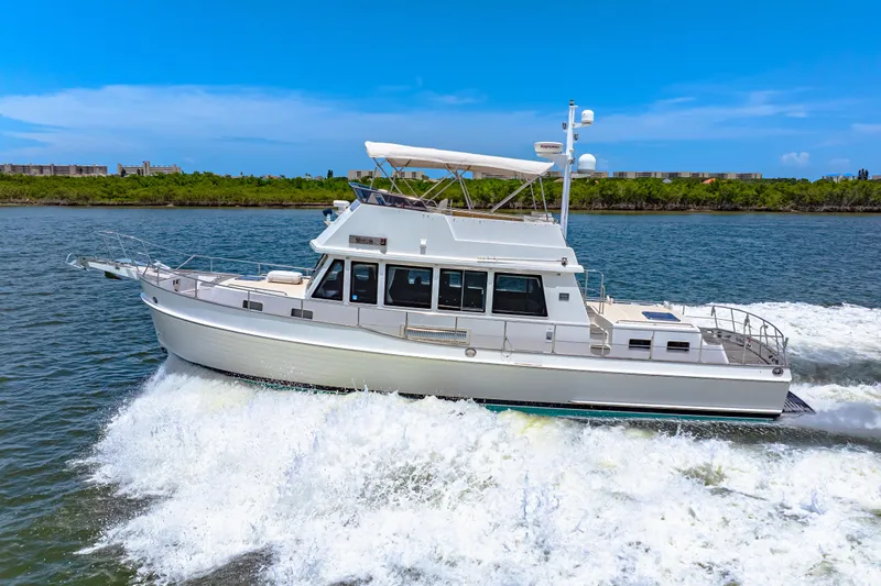 Grazie Yacht Photos Pics 2008 Grand Banks 47 Classic yacht cruising on a sunny day.