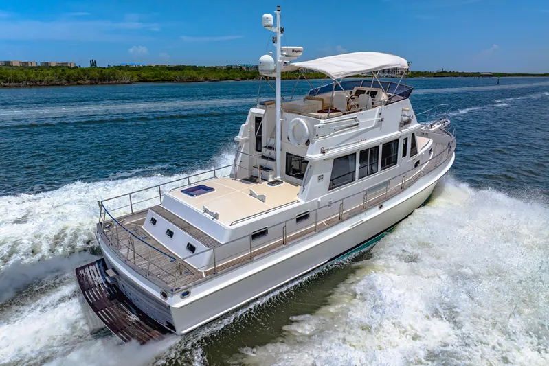 Grazie Yacht Photos Pics 2008 Grand Banks 47 Classic yacht cruising on open water.