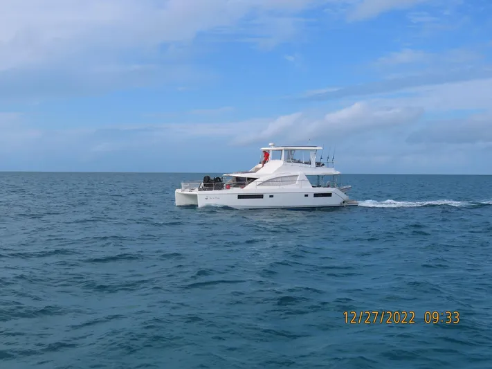  Yacht Photos Pics Leopard 51 Powercat 2016 cruising on open sea, December 2022.