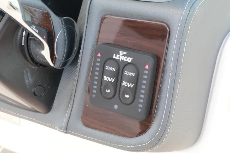  Yacht Photos Pics Control panel of 2021 Chaparral 300 OSX boat with Lenco trim tab switches.