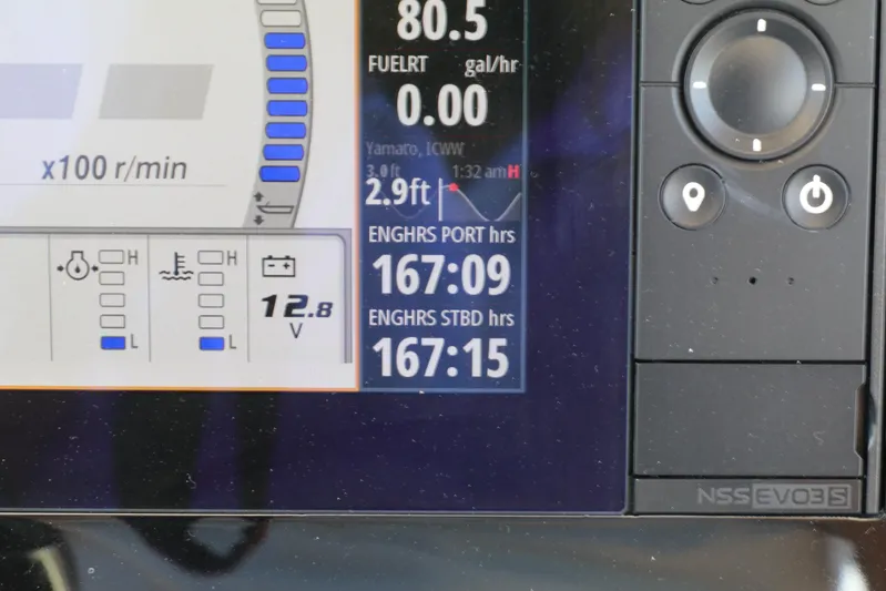  Yacht Photos Pics Display panel of 2021 Chaparral 300 OSX showing engine hours and fuel data.