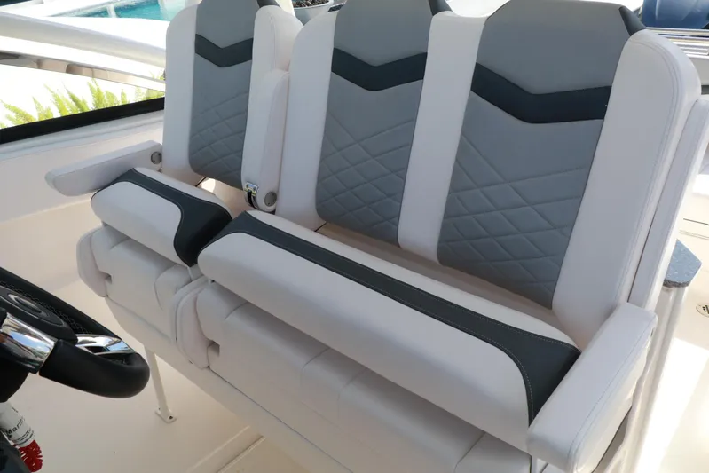  Yacht Photos Pics 2021 Chaparral 300 OSX boat seats with modern gray and white design.