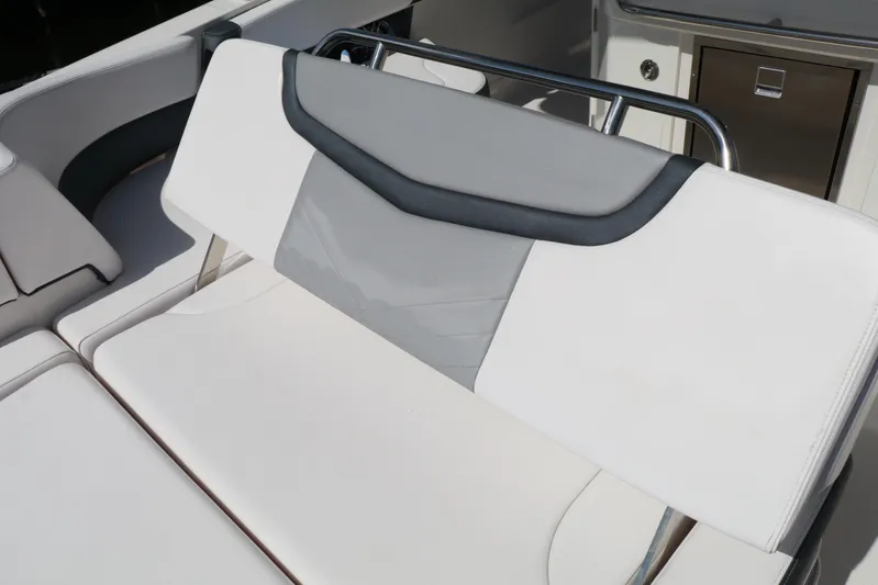  Yacht Photos Pics 2021 Chaparral 300 OSX boat interior seating with sleek, modern design and comfortable upholstery.