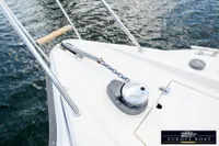 Bow of a 2000 Nimbus 310 Coupe with anchor chain and winch.