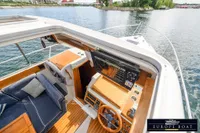 Interior view of a 2000 Nimbus 310 Coupe boat with navigation equipment.