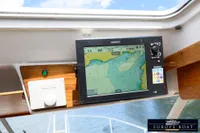 Navigation system on 2000 Nimbus 310 Coupe boat, displaying nautical map.