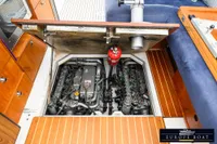 Engine compartment of a 2000 Nimbus 310 Coupe, showcasing detailed mechanical components.
