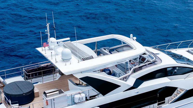 Captain Morgan II Yacht Photos Pics Azimut Grande 27 METRI yacht, 2021 model, cruising on open blue sea.