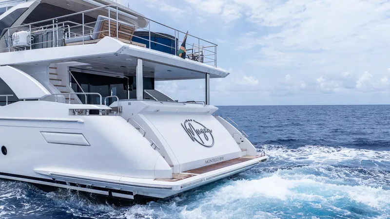 Captain Morgan II Yacht Photos Pics Luxury Azimut Grande 27 METRI yacht cruising on open sea, 2021 model.