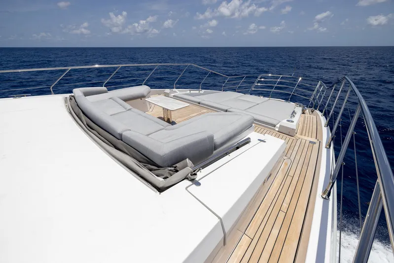 Captain Morgan II Yacht Photos Pics Luxurious 2021 Azimut Grande 27 METRI yacht deck with elegant seating and ocean view.