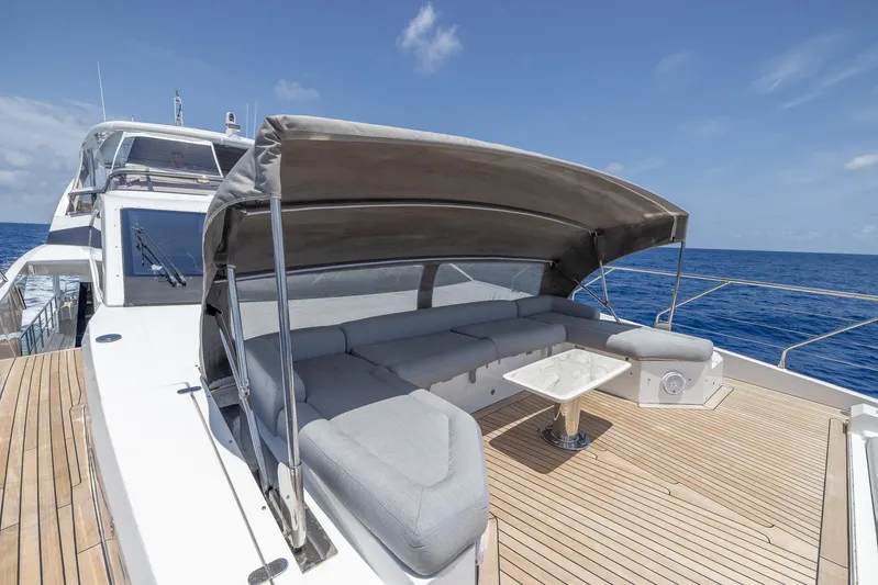 Captain Morgan II Yacht Photos Pics Luxurious 2021 Azimut Grande 27 METRI yacht with spacious deck and elegant seating area.