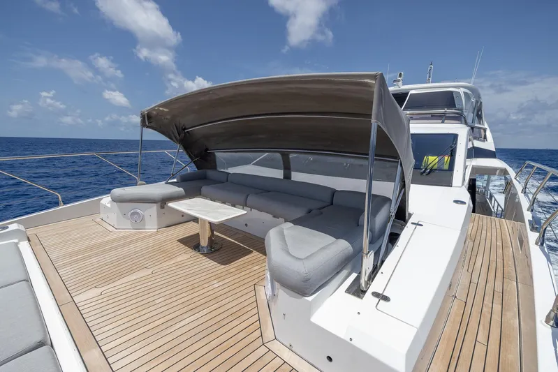 Captain Morgan II Yacht Photos Pics Luxurious 2021 Azimut Grande 27 METRI yacht deck with seating and ocean view.