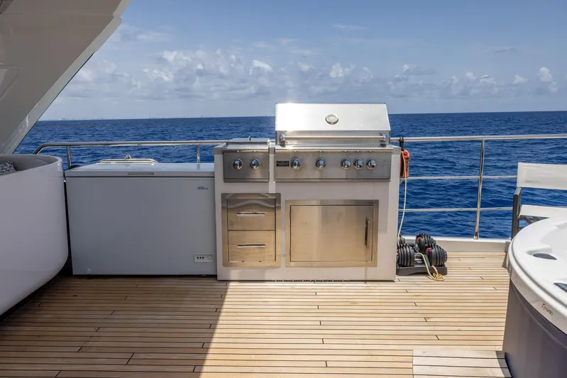 Captain Morgan II Yacht Photos Pics Outdoor grill on Azimut Grande 27 METRI yacht deck, overlooking the ocean, 2021 model.