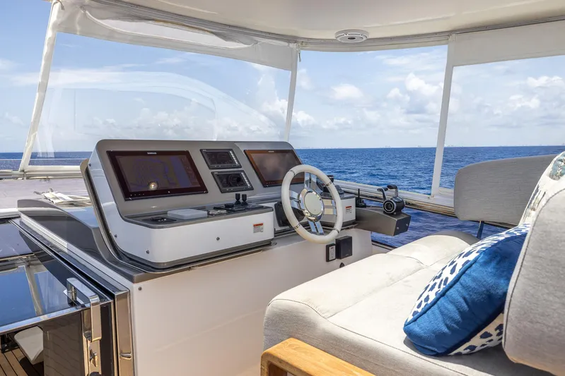 Captain Morgan II Yacht Photos Pics Luxurious helm of 2021 Azimut Grande 27 METRI yacht with ocean view.