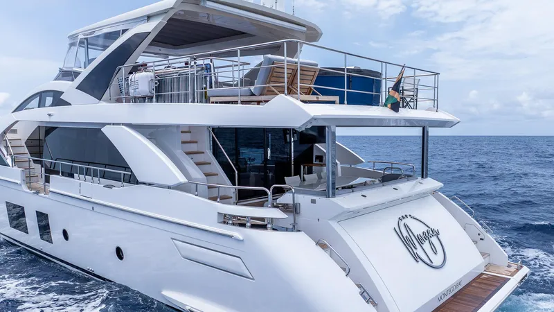 Captain Morgan II Yacht Photos Pics Luxurious 2021 Azimut Grande 27 METRI yacht cruising on open sea.