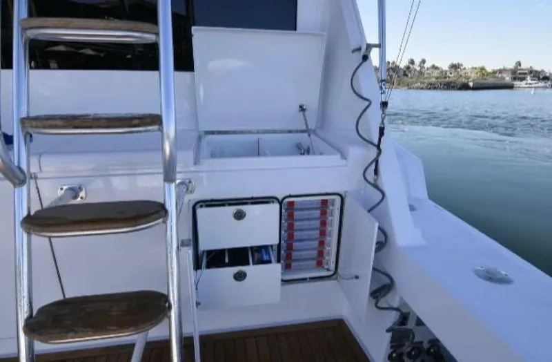 Burnin Daylight Yacht Photos Pics 2006 Hatteras 50 Convertible yacht deck with storage and ladder.