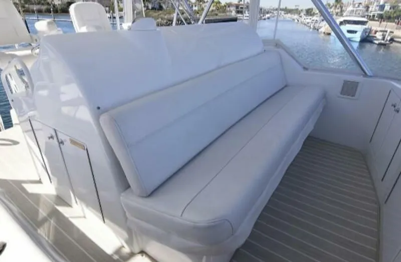 Burnin Daylight Yacht Photos Pics Hatteras 50 Convertible 2006 yacht with spacious white seating on deck.