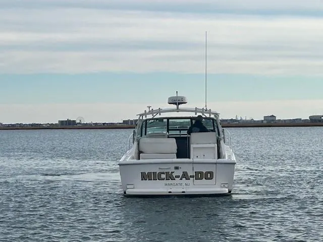 Mickadoo Yacht Photos Pics 2001 Tiara Yachts 3100 boat named "MICK-A-DO" on calm water, Margate, NJ.