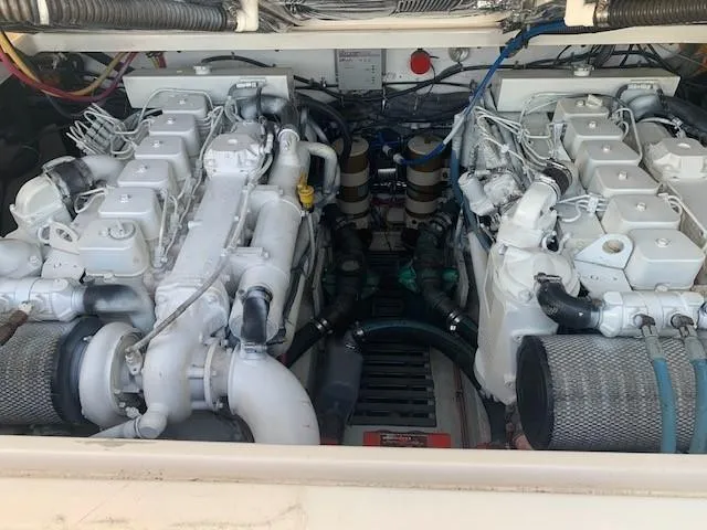 Mickadoo Yacht Photos Pics Engine compartment of a 2001 Tiara Yachts 3100, showcasing dual marine engines.