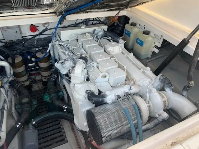Mickadoo Yacht Photos Pics Engine compartment of a 2001 Tiara Yachts 3100, showcasing detailed mechanical components.